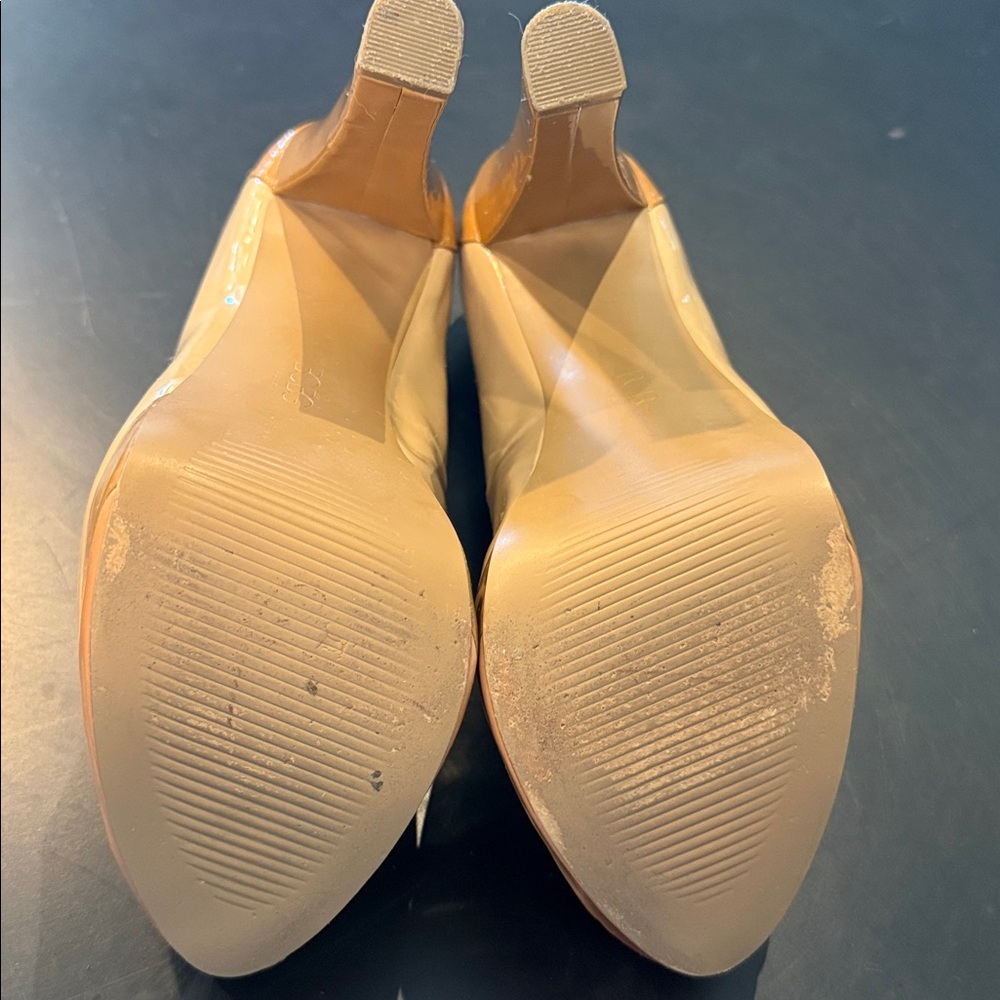BCBG Paris Nude Patent Leather Platform Pumps
Size 6.5 - Picture 8 of 10